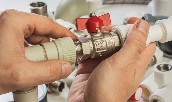 Man fixing a pipe